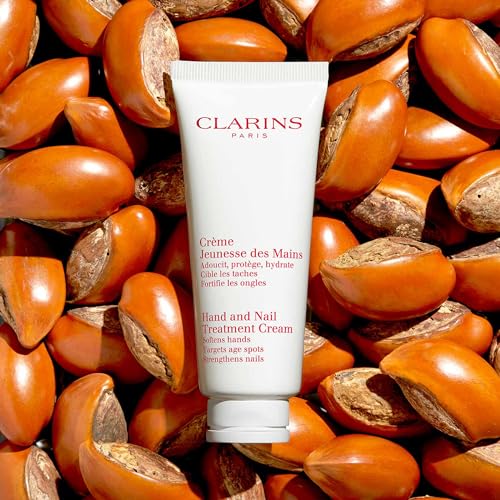 Clarins Hand and Nail Treatment Cream | Award-Winning | Softens, Nourishes and Shields Skin | Strengthens Nails and Conditions Cuticles | Natural Plant Extracts, Including Shea Butter