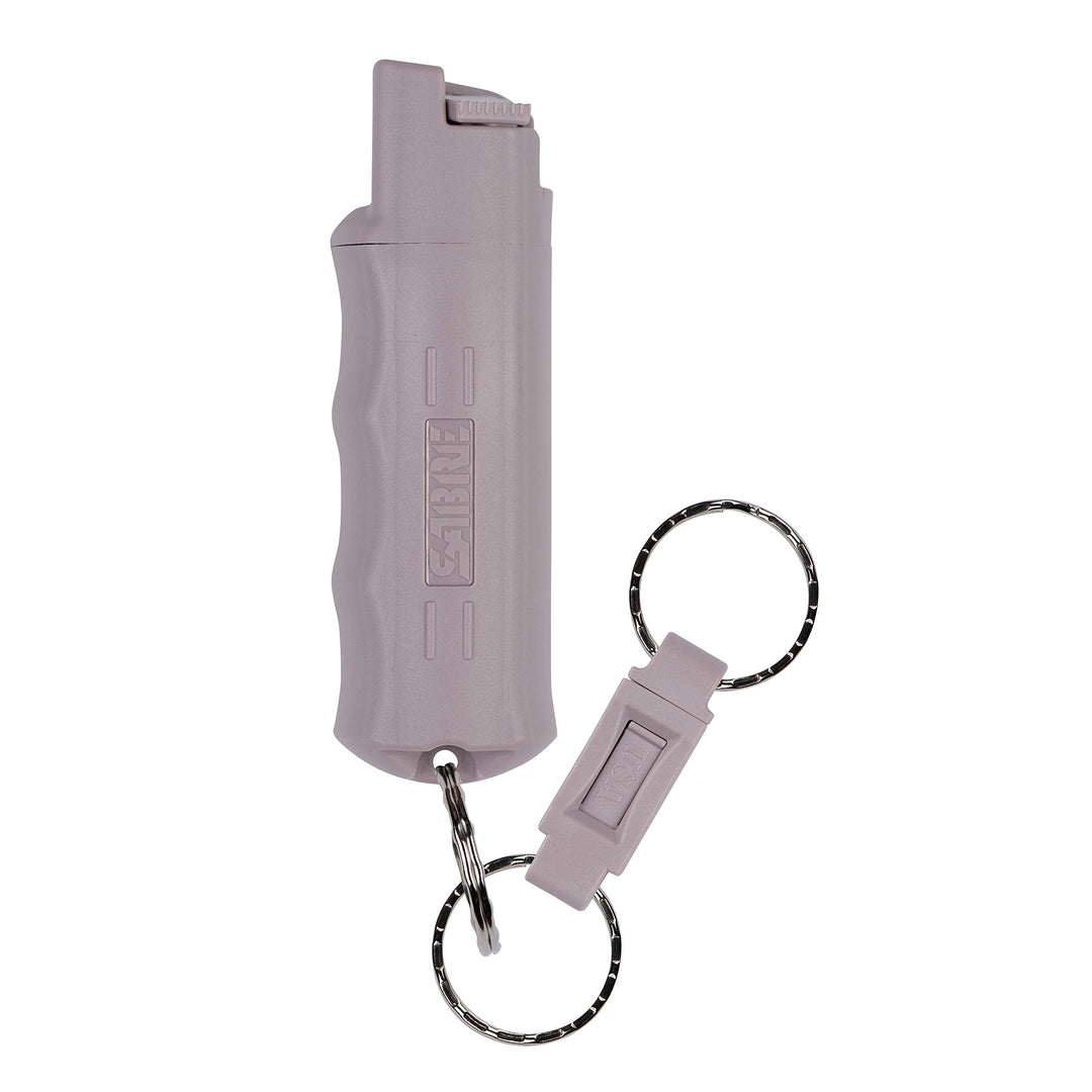 SABRE Defense Spray, 3-in-1 Formula Contains Max Strength Pepper Spray, CS Military Tear Gas & UV Marking Dye, Quick Release Key Ring for Easy Carry, Finger Grip for More Accurate Aim, 0.54 fl oz