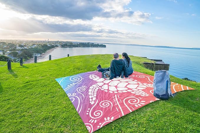 WEKAPO Beach Blanket Waterproof Sandproof Oversized Extra Large Sand Free Beach Mat with Stakes, Storage Bag - Essentials for Outdoor Beach, Picnic (Pinkish Purple Sea Turtle, 11 X 9 FT (1~10 Person))