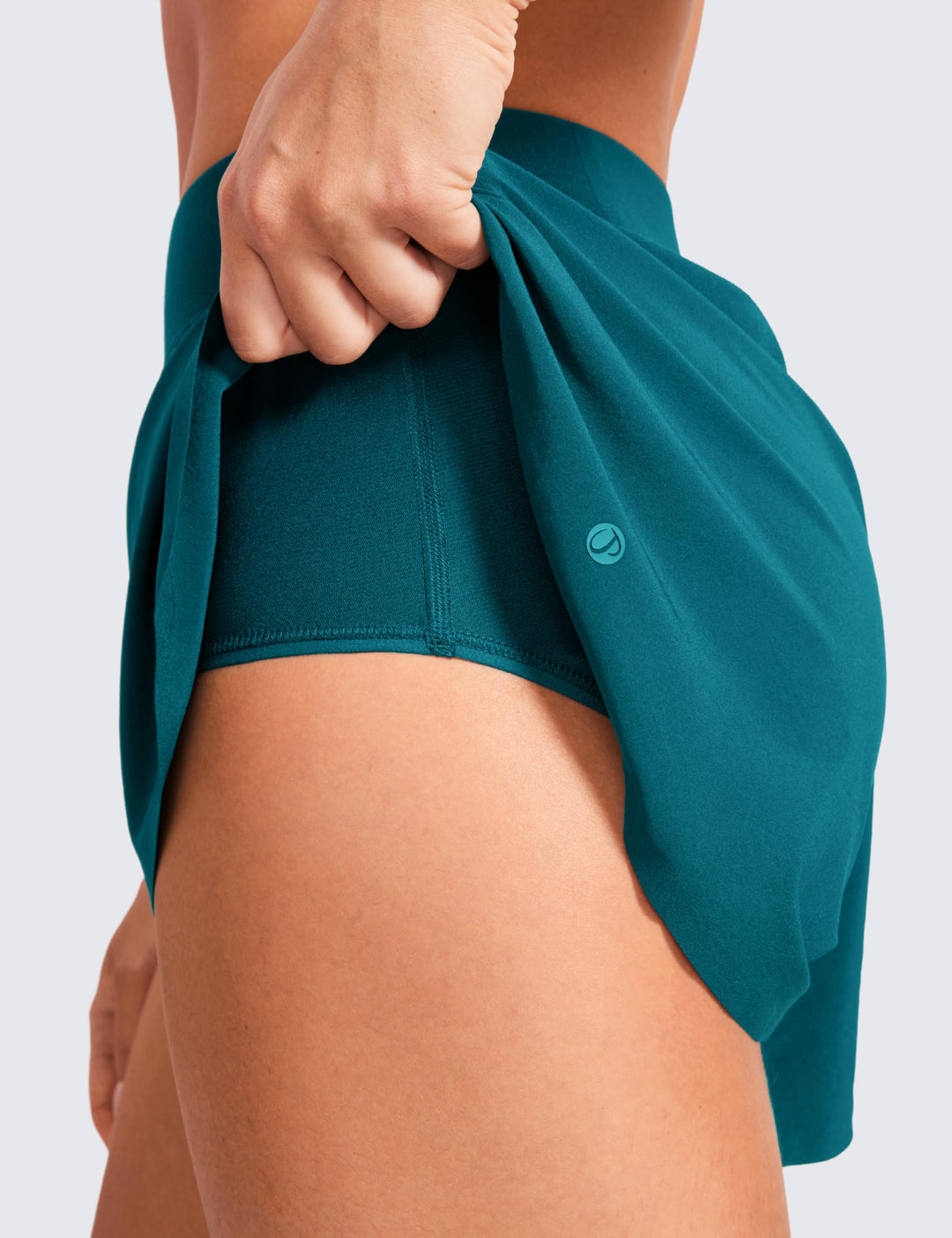 CRZ YOGA Mid Waisted Dolphin Athletic Shorts for Women Lightweight High Split Gym Workout Shorts with Liner Quick Dry Borealis Green XX-Small