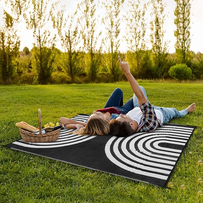 Anidaroel Outdoor Area Rug for Patio Clearance 6X9ft Waterproof, Reversible Plastic Straw Rug Outside Rug, UV Resistant RV Mat for Camping, Porch, Balcony, Pool Deck(Black&White, 6‘x9')