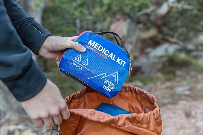 Adventure Medical Kits Mountain Series Medical Kit - Explorer - Emergency Medical First Aid Kit - For 4 People for 7 Days - Comes with a Trauma Pad, Medicine, Guide Book & More