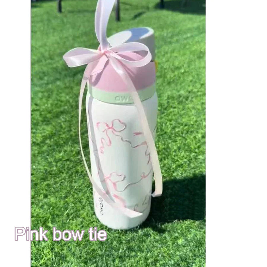 Owala FreeSip Blue Bow Tie Water Bottle
